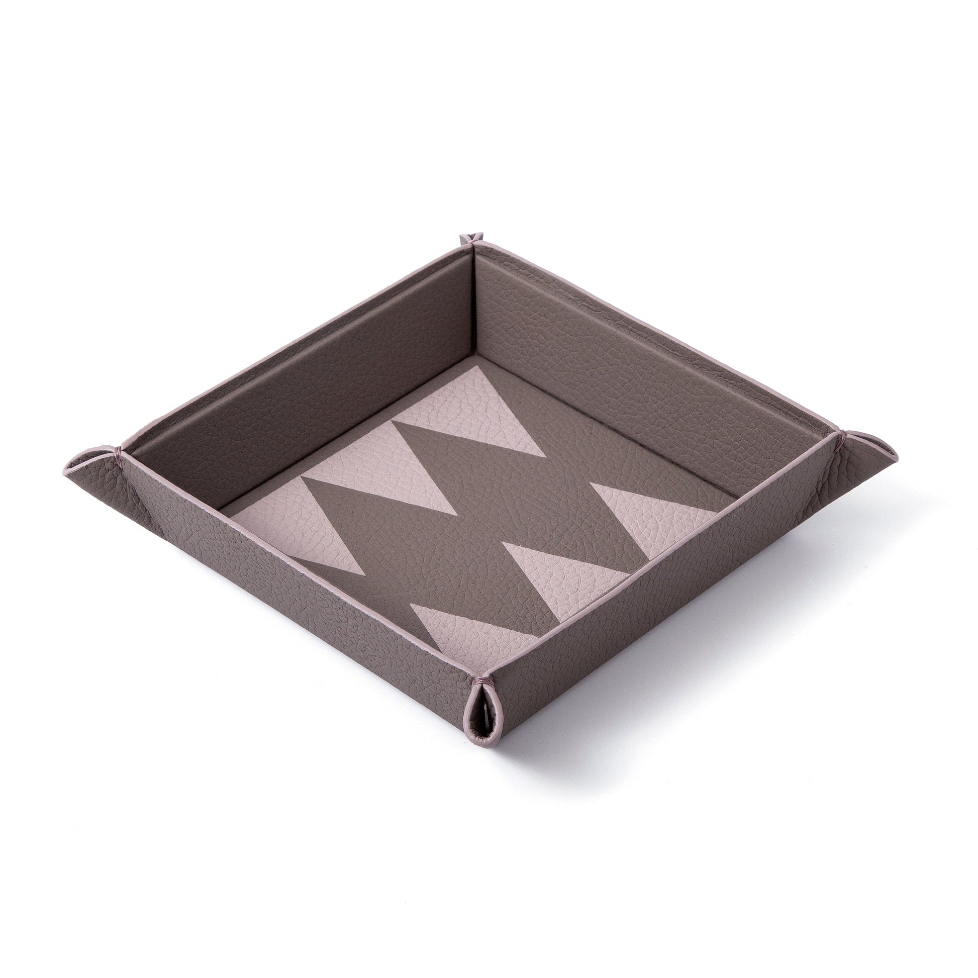 Vide poche trays meant to lighten up your load, and give you joy wherever you choose to place them. 100% Leather