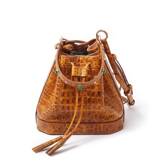 Madame Malachite Jeweled with malachite and agate stones, this bucket bag will help you catch those special moments. 100% Leather, natural malachite stone